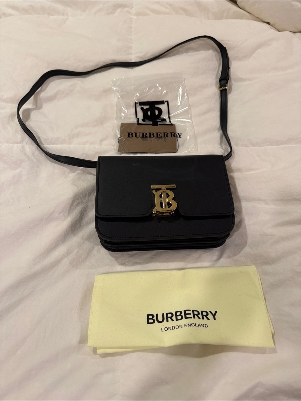 Source Unknown Black Leather Messenger Bag with Gold TB Emblem